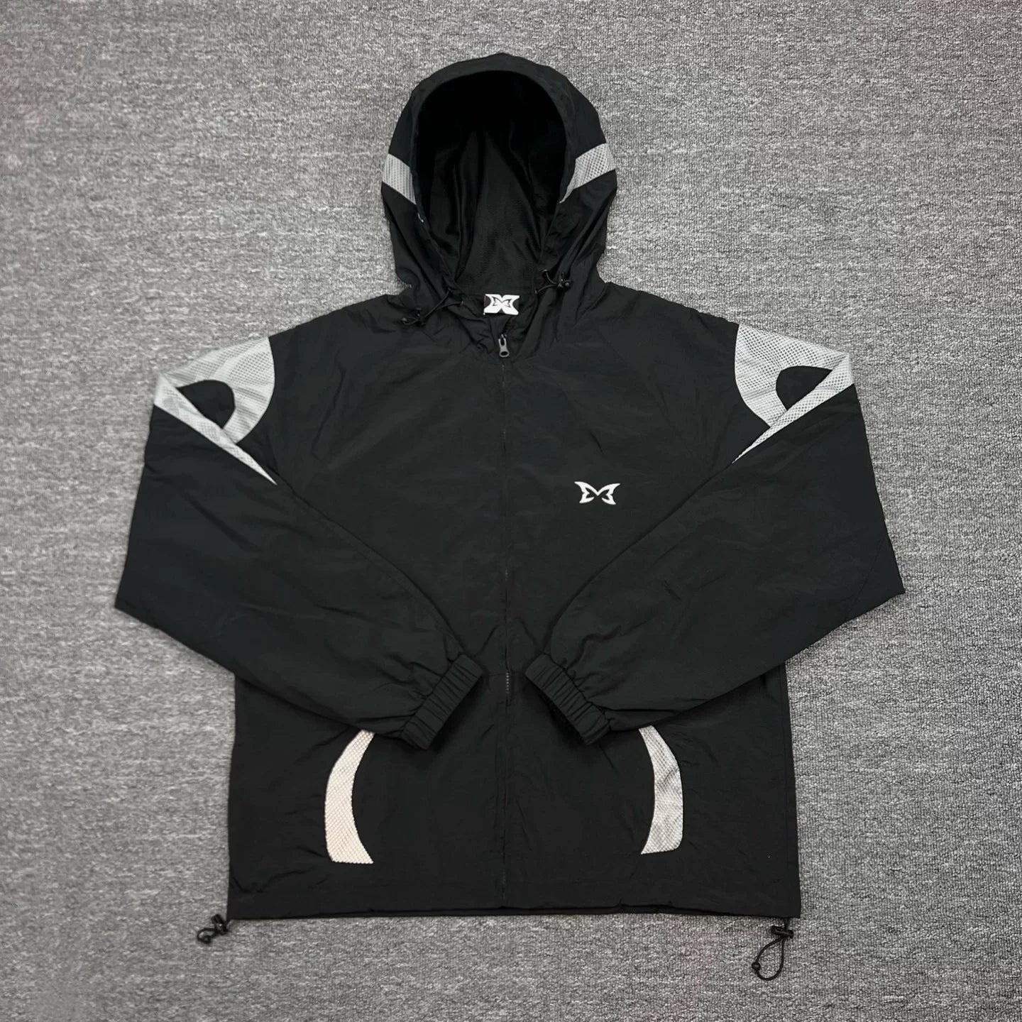 Mertra Patterned Panel Hooded Windbreaker - Black